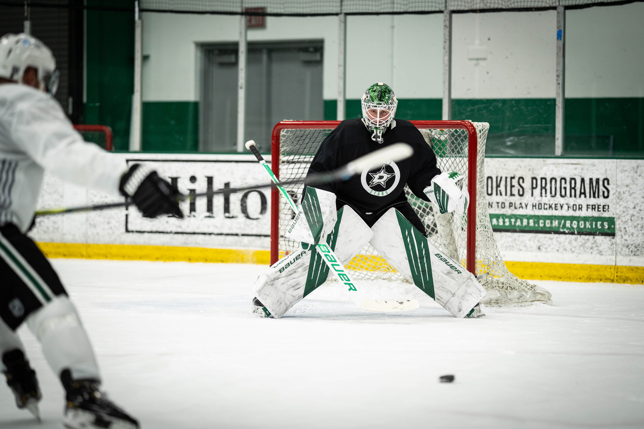 Carey Rie looking down ice close up